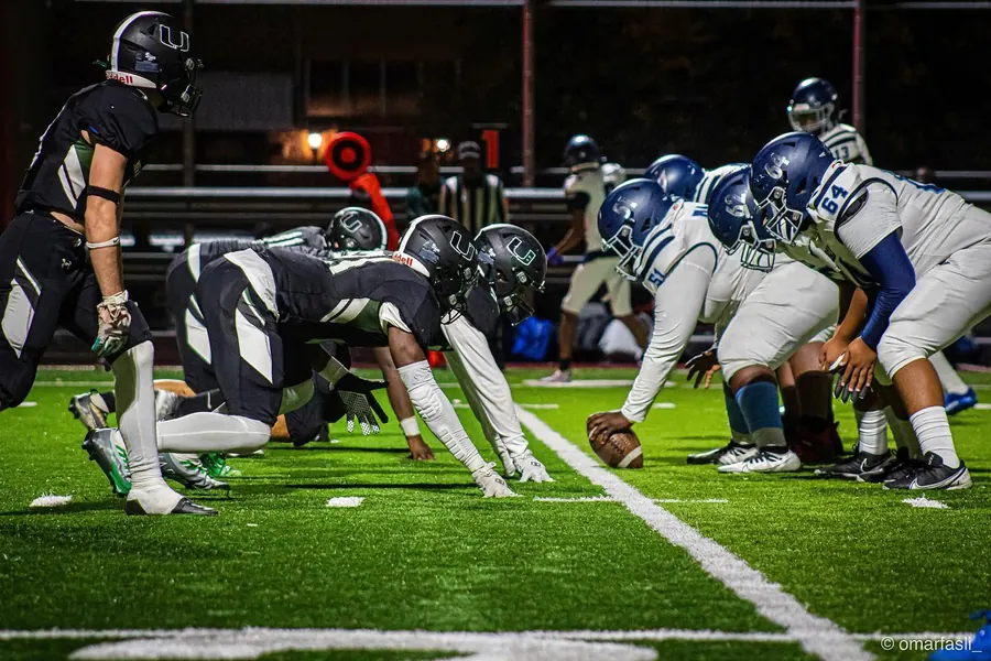 Two football lines set before the snap